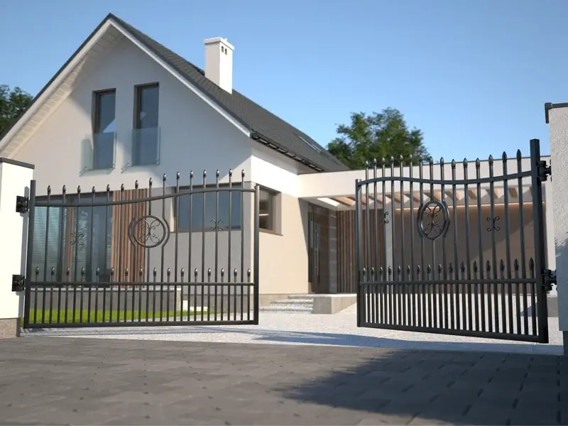 Elegant black wrought iron gates opening to a modern residential property, showcasing secure access and curb appeal.