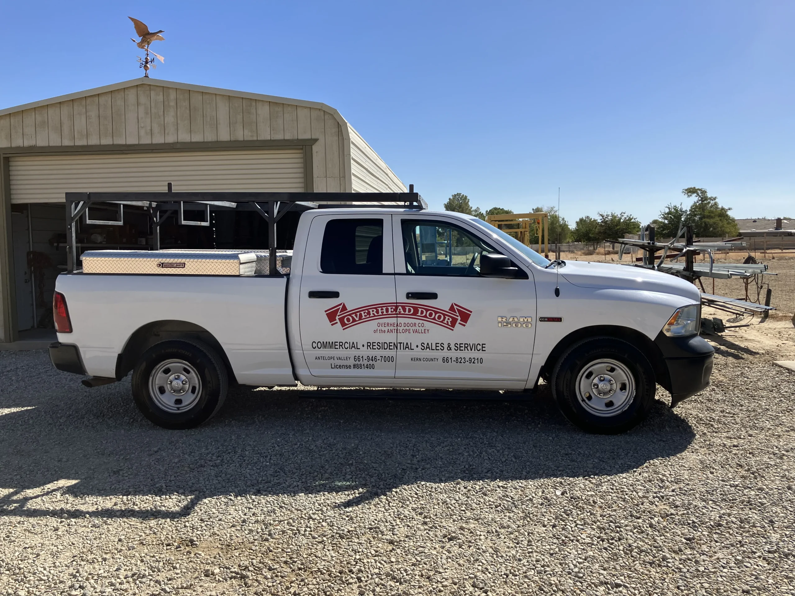 Local garage door repair service vehicle in a residential area, representing community trust and service
